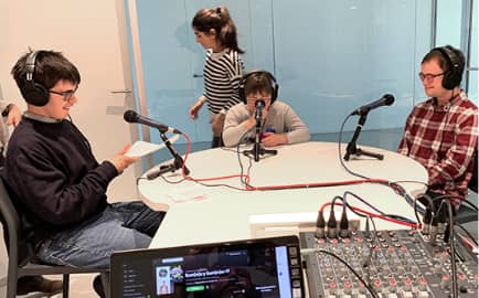 Three students in the radio room